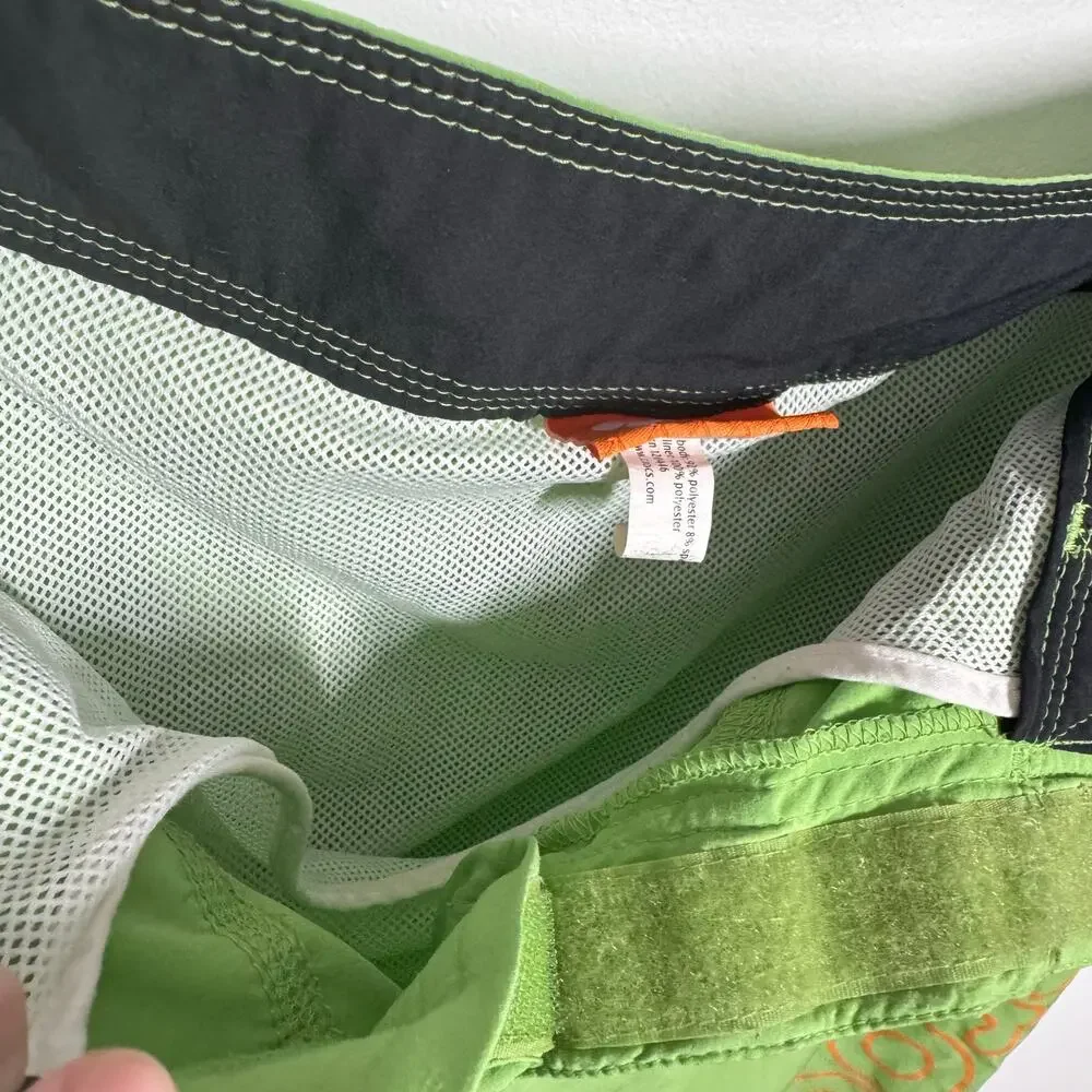 Crocs Mens Swim Trunks Green Mesh Lined Lace Up Pockets‎ Spell Out Pool Vacation